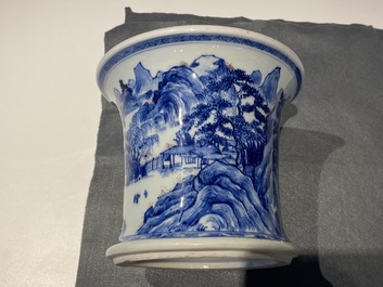 A fine Chinese blue, white and copper red 'Master of the Rocks' brush pot, Kangxi